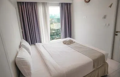 اتاق 2 تخته با یک تخت دو نفره در هتل آراد مشهد