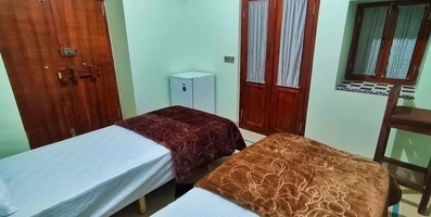 اتاق دو تخته تویین اقامتگاه سنتی ملک تاج شیراز