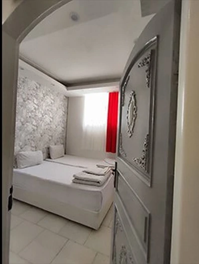 اتاق دو تخته تویین هتل آپارتمان مارال مشهد