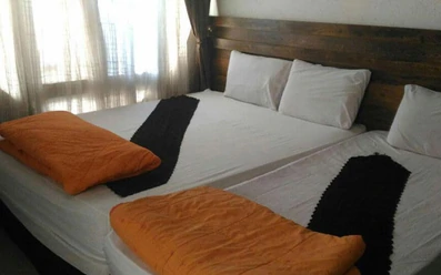 اتاق سه تخته هتل آپارتمان پارمین مشهد