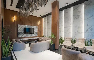 لابی مبله شده هتل رادیس مشهد به همراه تلویزیون و مبل های راحتی مدرن